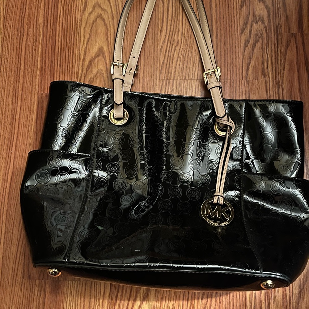 Never carried Michael Kors patent tote never worn for sale!!